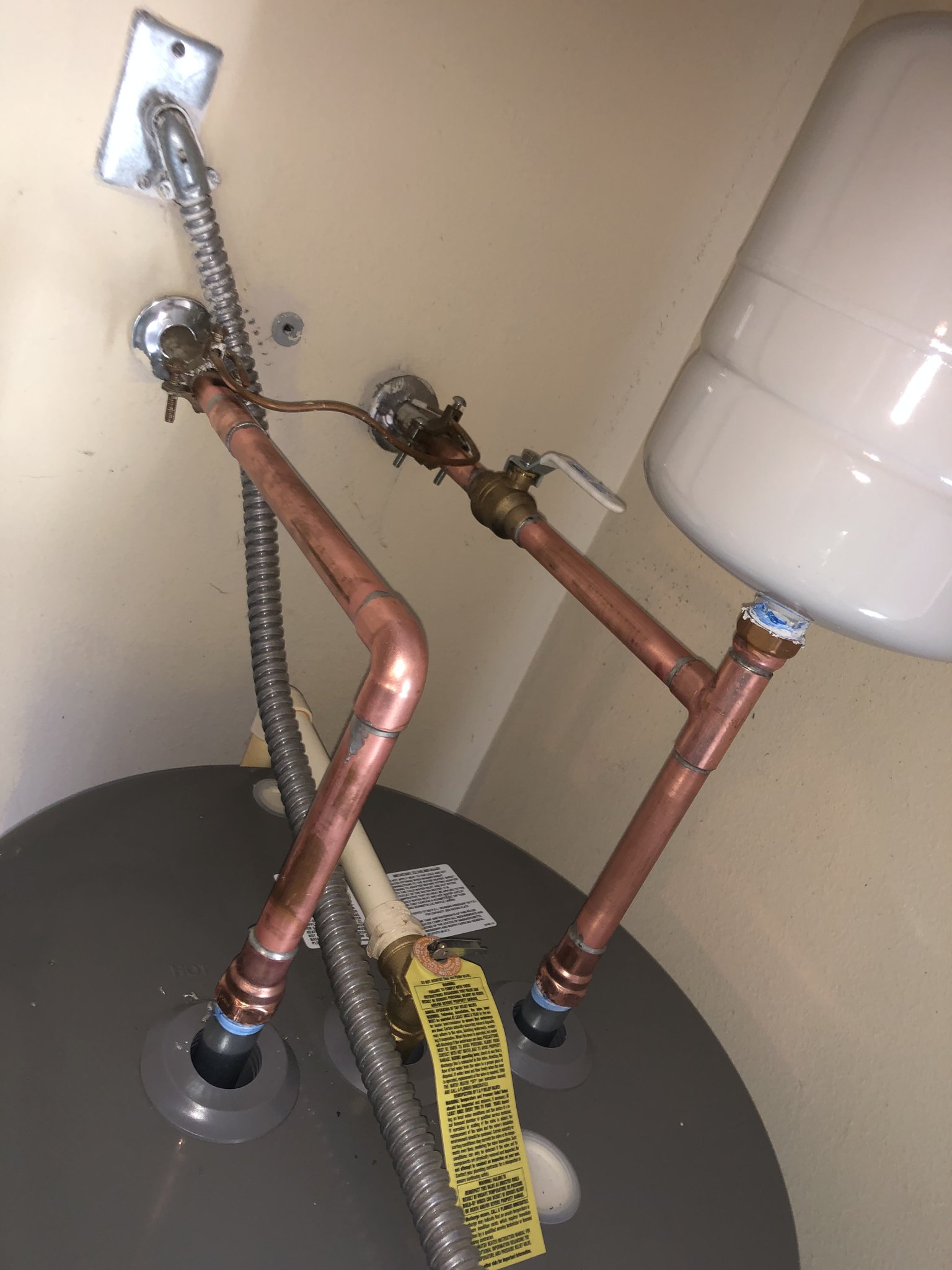 Copper supply lines and expansion tank on a Palm Coast water heater