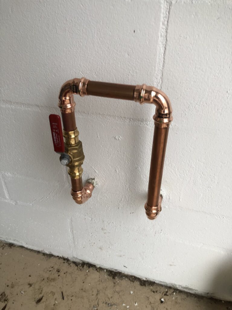 Copper connections and pressure-reducing valve at a Palm Coast water main