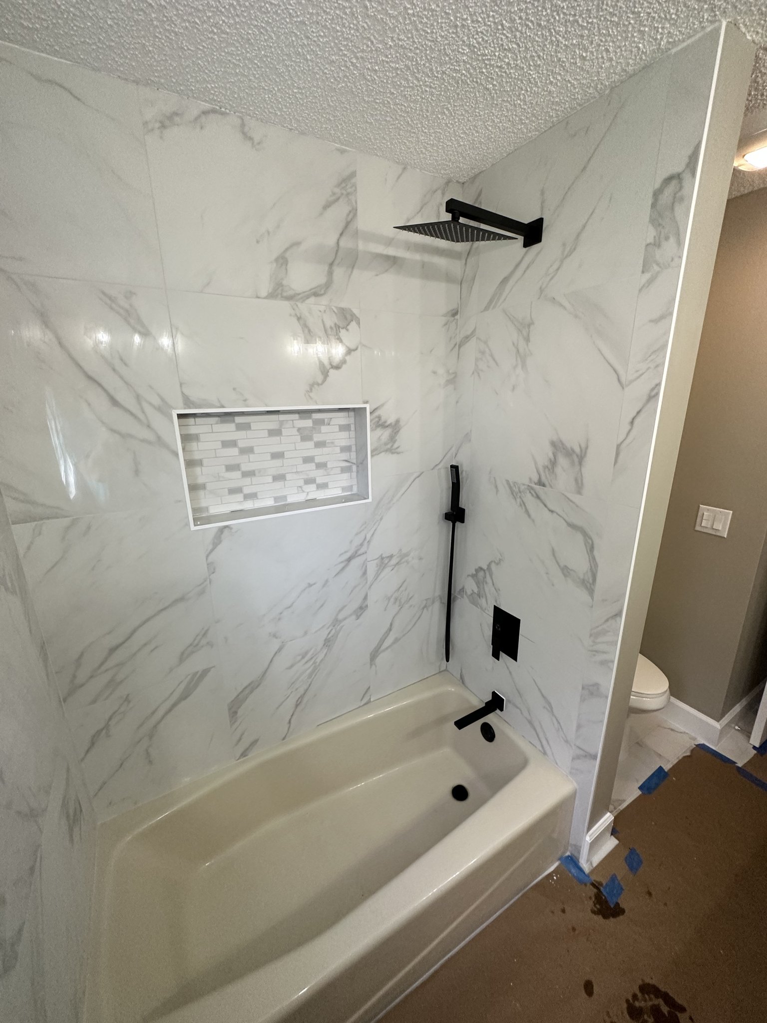 Water heater replacement and full bathroom remodel.