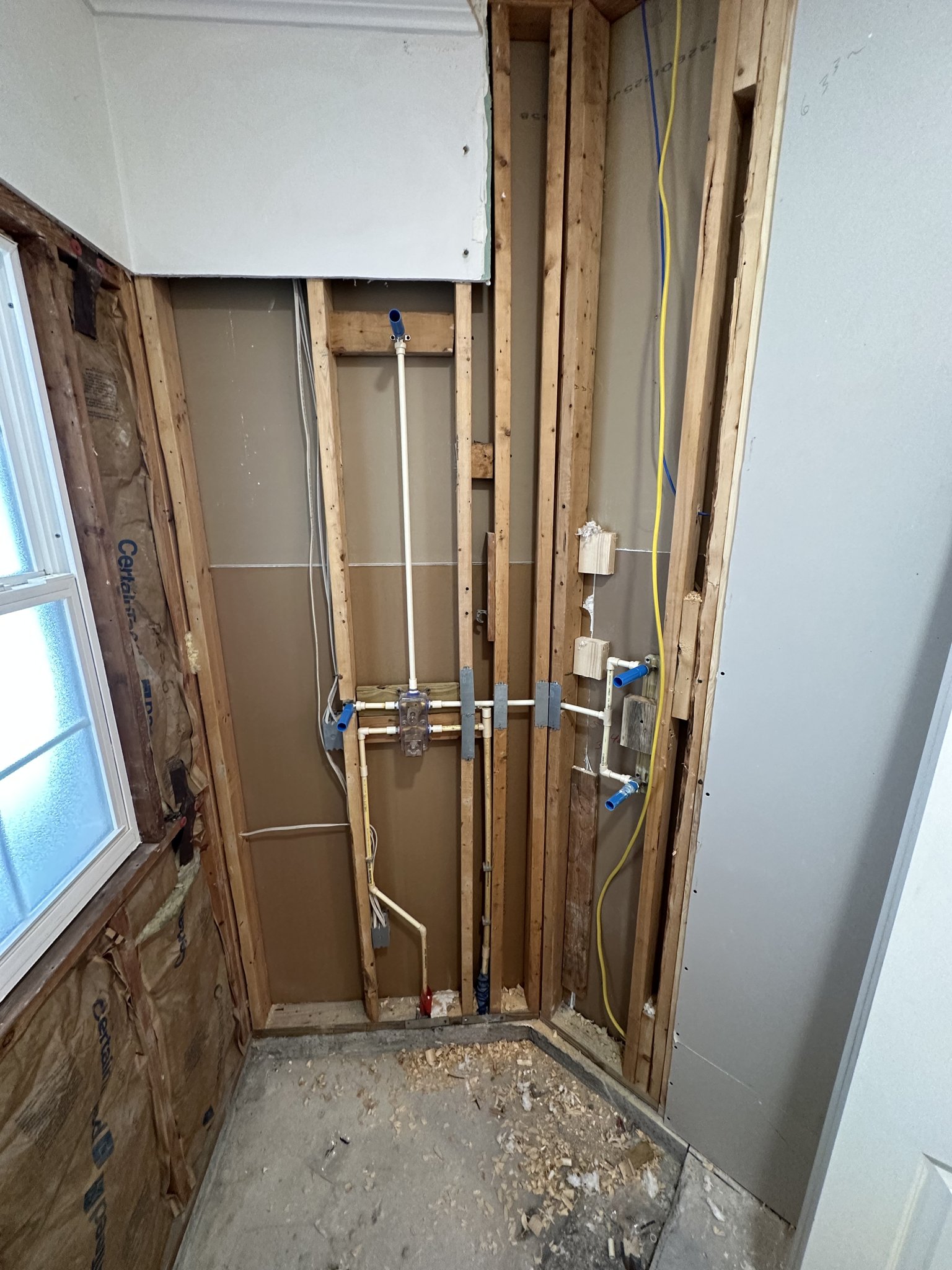 Bathroom remodel with under-slab drain rework, filtration and tiled shower.