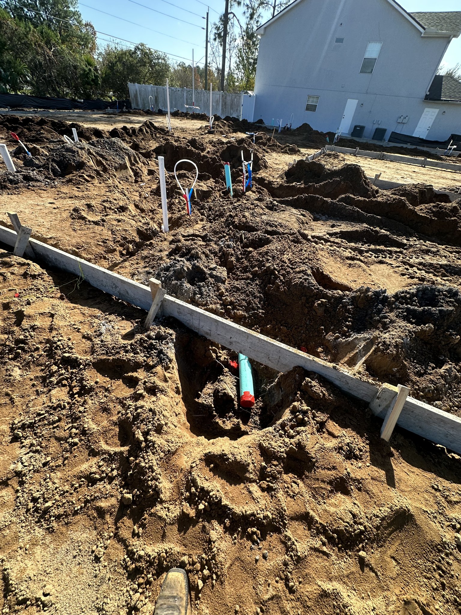 New-construction underground plumbing rough-in.